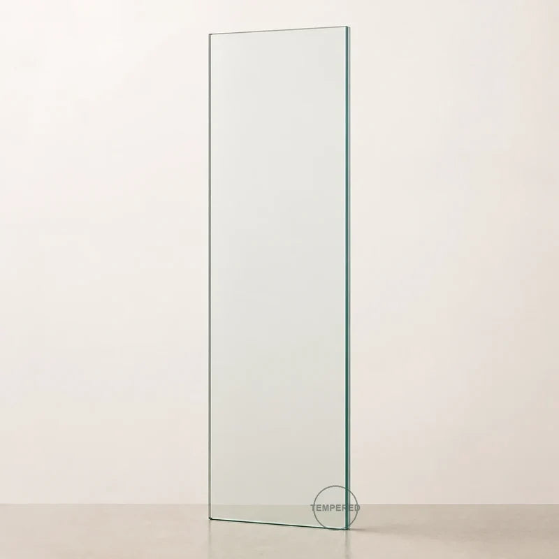 Clear tempered safety glass pane, 24 inches wide by 60 inches high, with tempered mark