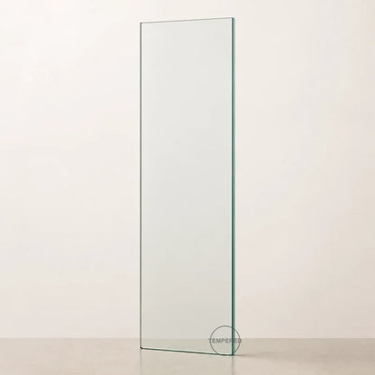 Clear tempered safety glass pane, 24 inches wide by 60 inches high, with tempered mark