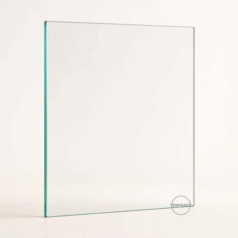 Clear tempered safety glass pane, 5 inches wide by 7 inches high, with tempered mark